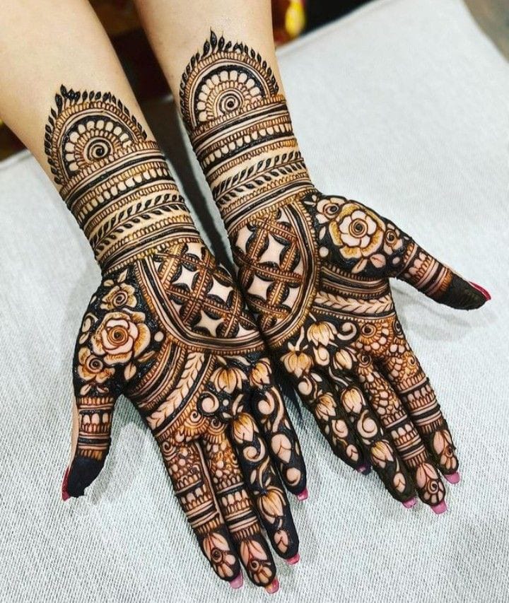 Simple engagement mehndi design  with small floral motifs - Krishnarajapuram, Bangalore.